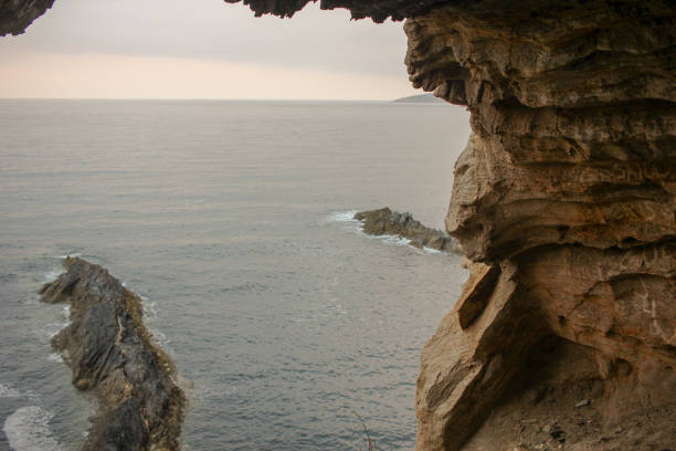 a view of the Cantabrian sea from inside Cova da Doncella in Viveiro, Spain