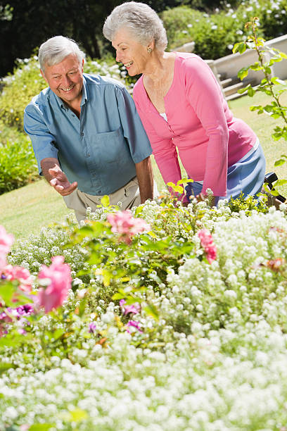 istock Senior couple working in garden 179208915