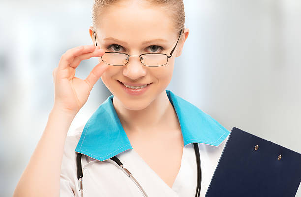 istock friendly woman doctor smiling with 179209040