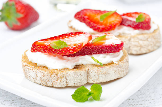 istock bruschetta with goat cheese, fresh strawberries and mint 179209186
