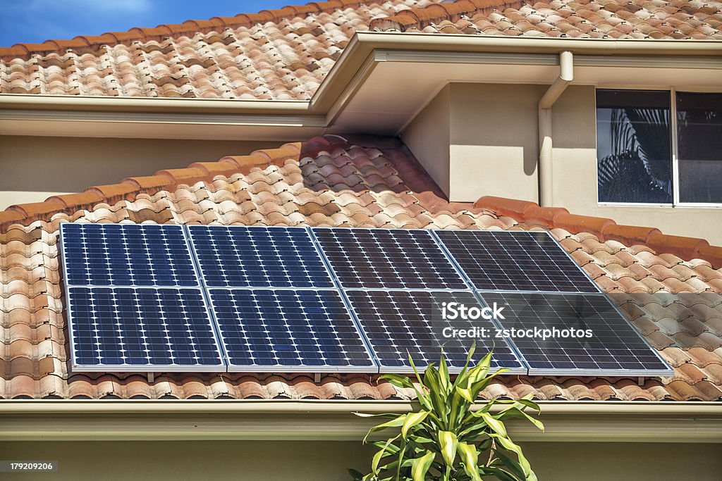 Solar panels on home Solar panels on suburban Australian home Solar Panel Stock Photo