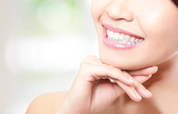 istock Beautiful young woman teeth close up 179209253