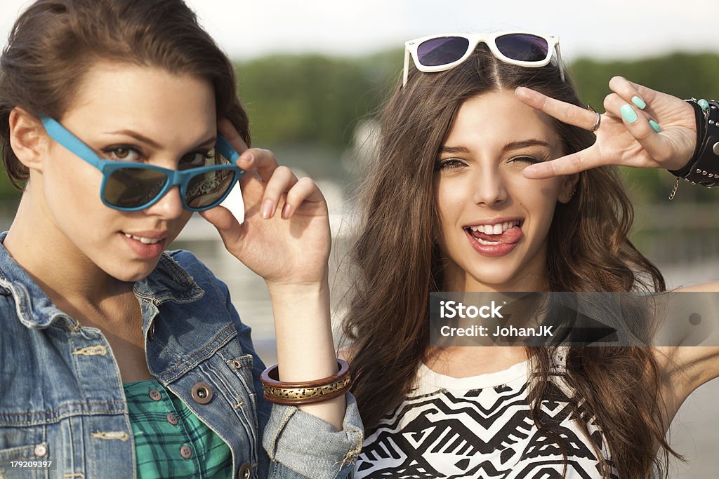 Group of young people Portrait of two young woman having fun. Outdoors, lifestyle Adult Stock Photo