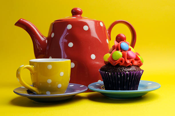istock Colorful candy cupcake with polka dot tea pot and cup. 179209929