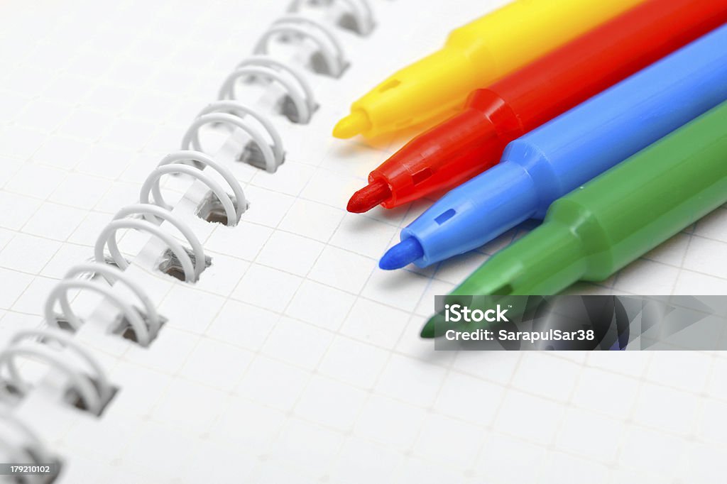 Notebook and felt-tip pens. Notebook and felt-tip pens . Backgrounds Stock Photo