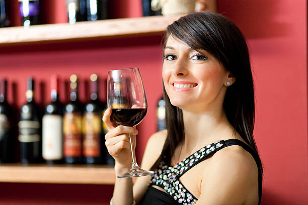 istock Woman holding a wineglass 179210289