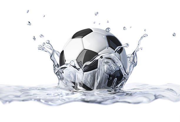 istock Soccer ball falling into clear water, forming a crown splash. 179210362