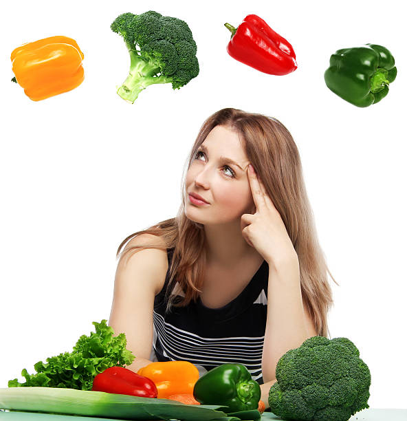 istock Beautiful young woman with vegetables 179210502