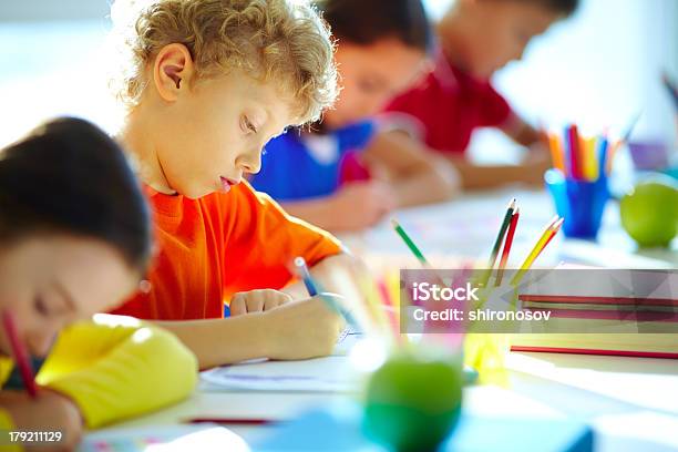 Schoolboy At Lesson Stock Photo - Download Image Now - Beautiful People, Boys, Child