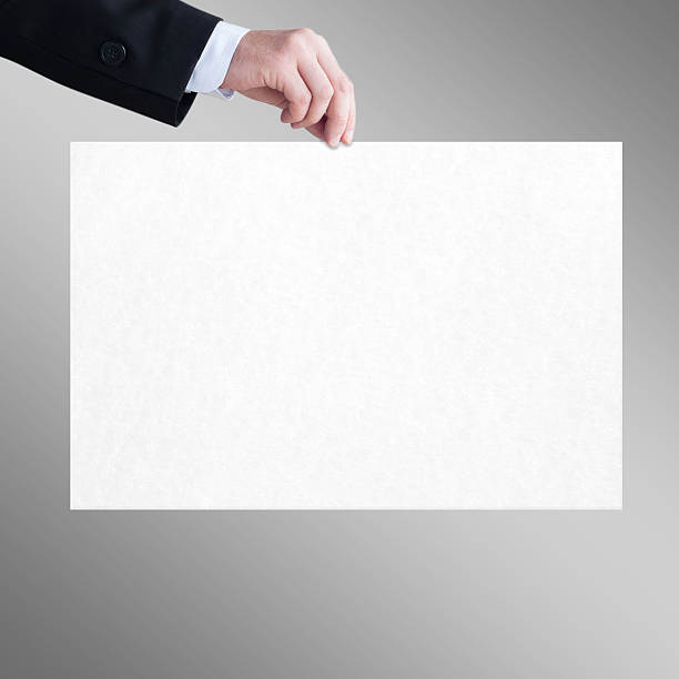 istock White sheet in the men hand 179211409