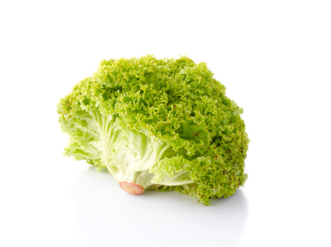 Fresh, green lettuce isolated on white background