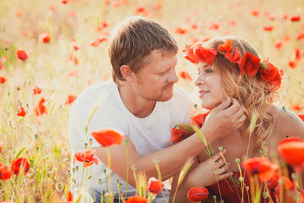 istock Couple on the poppy meadow 179211859