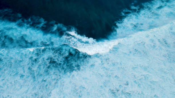 istock Turquoise ocean sea water white wave pattern splashing deep blue sea. Seascape dark ocean background wave splash on rock. Tropical sea beach in summer seaside outdoor. Water Surface blue wave pattern 1792119976