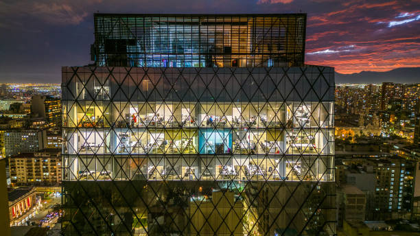 Illuminated office building in the early evening