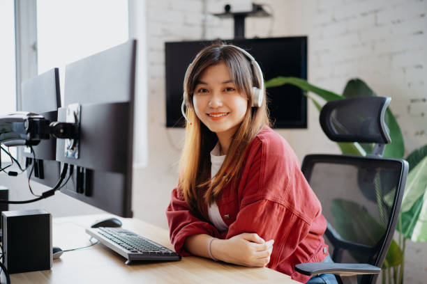 istock Young Asian businesswoman at her work desk 1792120184