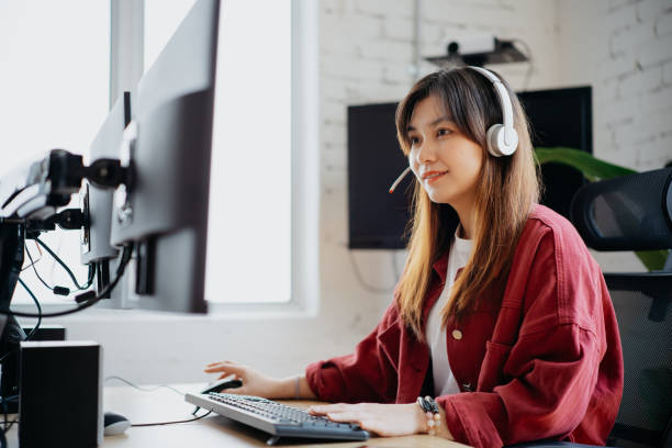 istock Young businesswoman using computer at her desk 1792120185