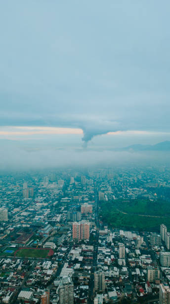 Giant whirlwind-shaped cloud in the sky - vertical photo