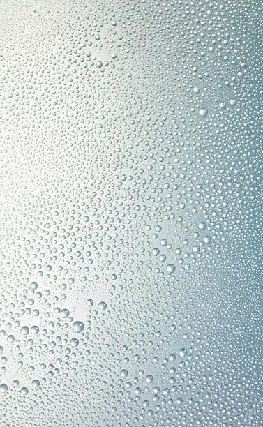 Photo of water drops on a glass surface