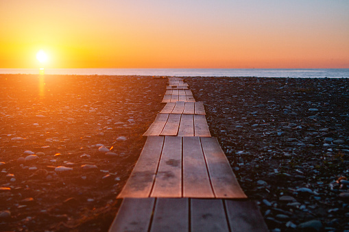 Pathway to the sea. Beautiful sunset landscape. Find your way. Path leading to the sea