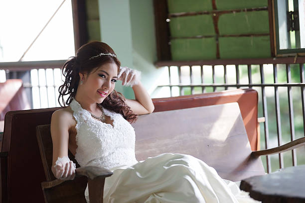 istock Young Asian lady in white bride dress 179212141