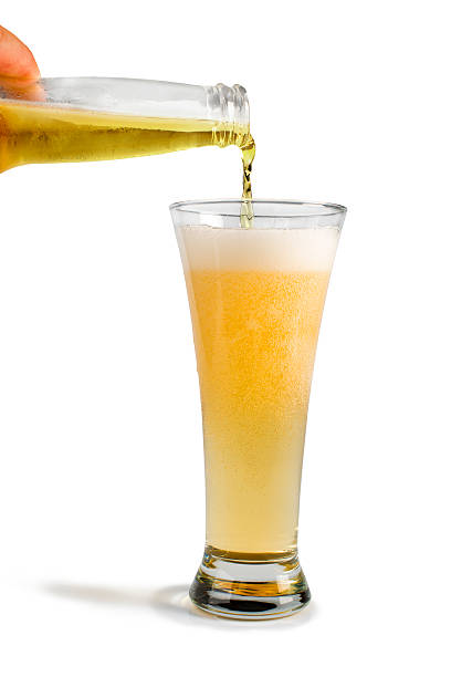 istock Hand holding bottle of beer and mug 179212221