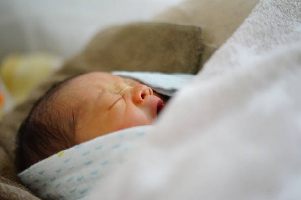 istock newborn baby yawning 1792124110