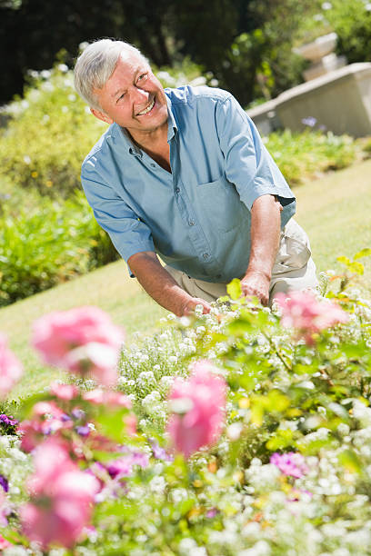istock Senior man working in garden 179212599