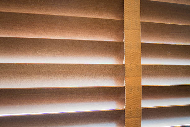 istock Beautiful interior wooden blinds, jalousie or shutter closed 179213324