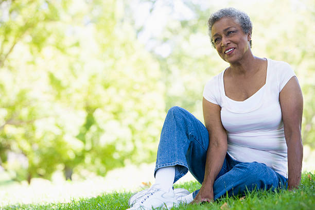istock Senior woman relaxing in park 179213365