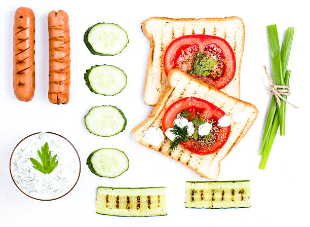 istock Breakfast set of toast bread, tomato, sausage and herbs, 179214048