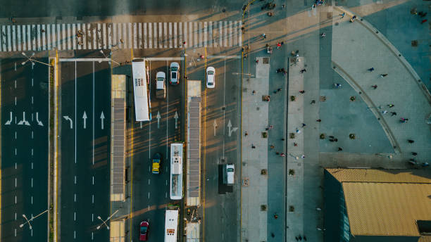 istock Bus stations and pedestrians passing on the sidewalk heading home 1792143664