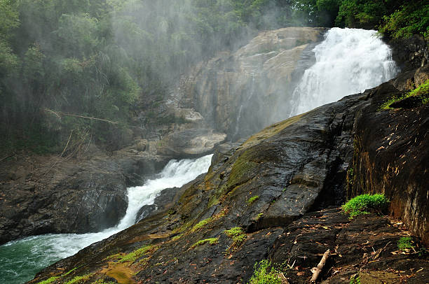 istock Water spray and mist rising from a large waterfall. 179214382