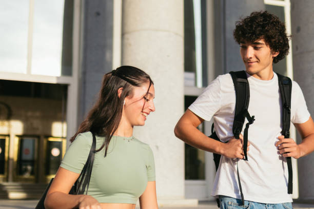 istock Happy classmates wearing casual clothes leaving college. 1792146825