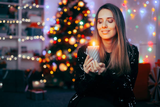 istock Happy Girl Holding a Microphone Singing Carols 1792153178