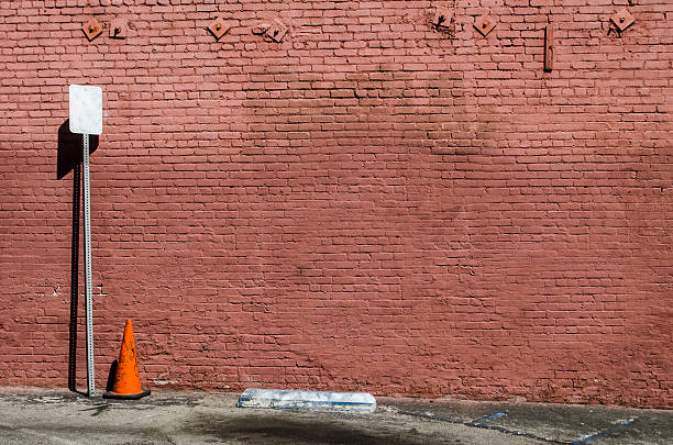 istock traffic cone in parking area 179215797