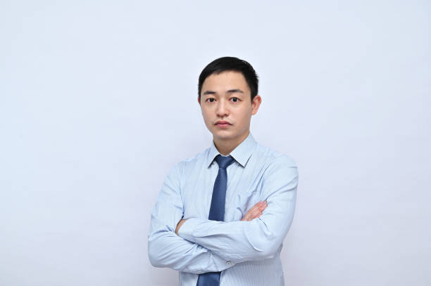 istock Asian male office worker, professional pose, white background 1792160042