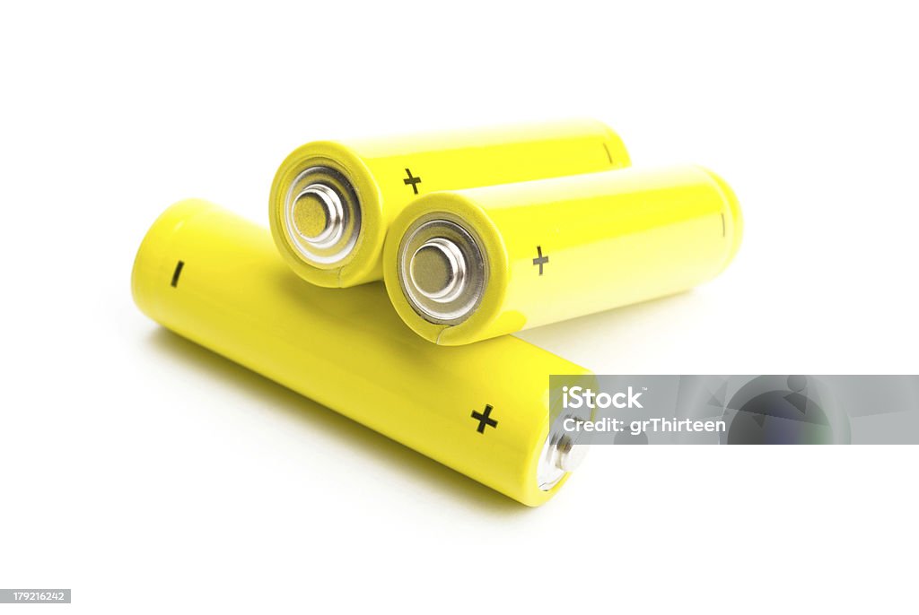 yellow alkaline batteries isolated on white background Alkaline Stock Photo