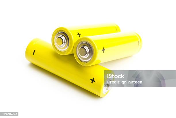 Yellow Alkaline Batteries Isolated On White Background Stock Photo - Download Image Now