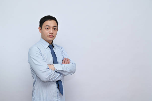 istock Asian male office worker, professional pose, white background 1792163003