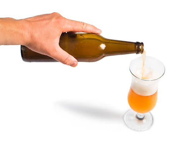 istock Hand holding bottle of beer and mug 179216414