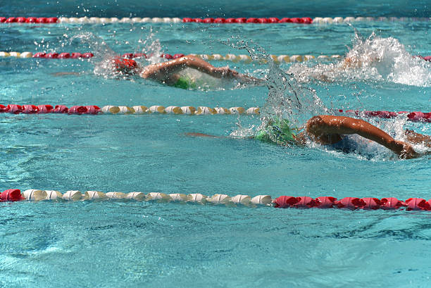istock Two female freestyle swimmers 179216526