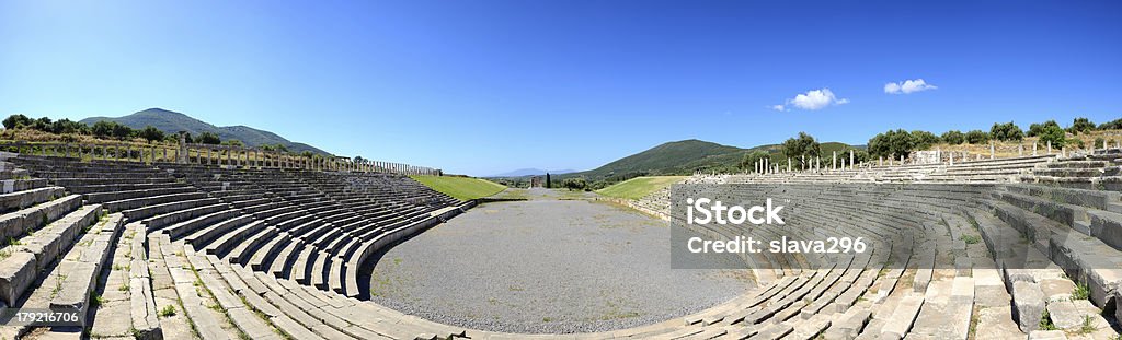 Panorama of stadium with mausoleum in ancient Messene, Peloponnes, Greece The Panorama of stadium with mausoleum in ancient Messene (Messinia), Peloponnes, Greece Ancient Stock Photo