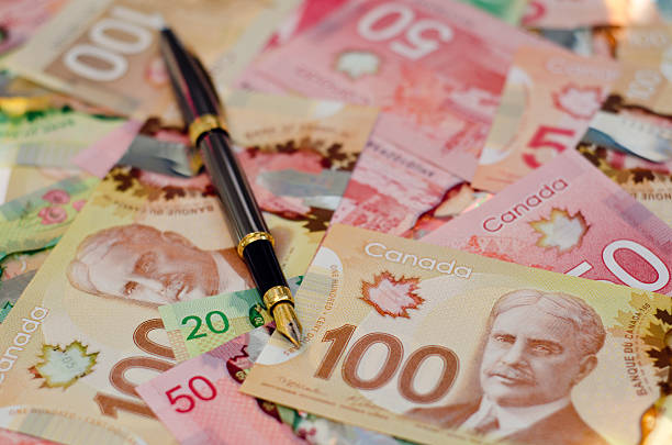 istock Fountain pen on a pile of money 179216726