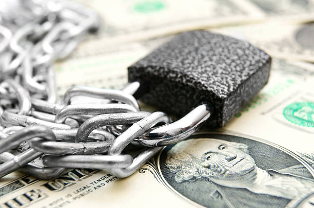 istock The lock, chain and money. 179218158