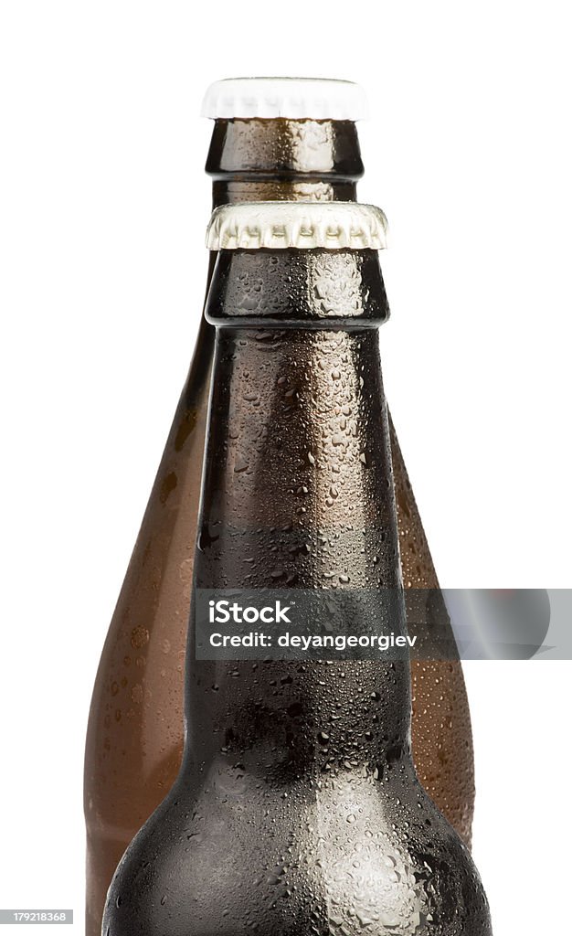 Garrafas de cerveja marrom isolada - Foto de stock de Amarelo royalty-free