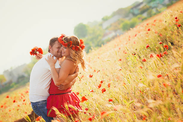 istock Couple on the poppy meadow 179218879