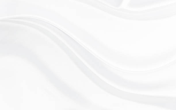 istock White gray satin texture that is white silver fabric silk background with beautiful soft blur pattern natural. 1792197883