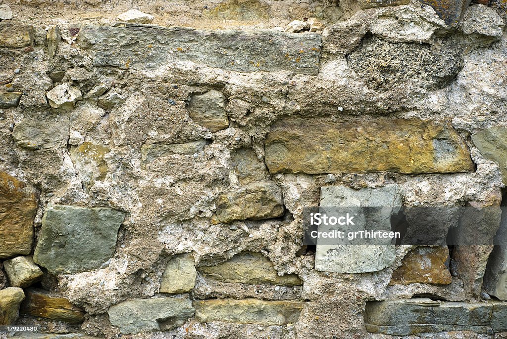 背景の石の壁の質感 - ひびが入ったのロイヤリティフリーストックフォト
