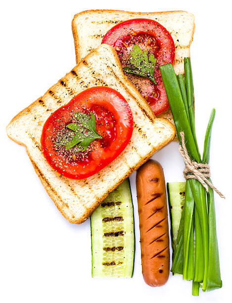 istock Breakfast set of toast bread, tomato, sausage and herbs, 179220559