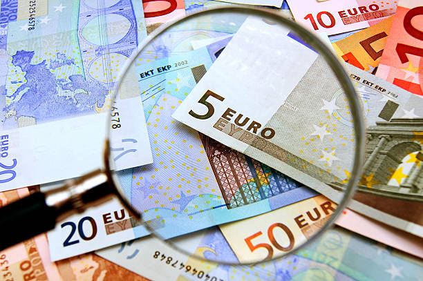 istock Money and magnifier. 179222008